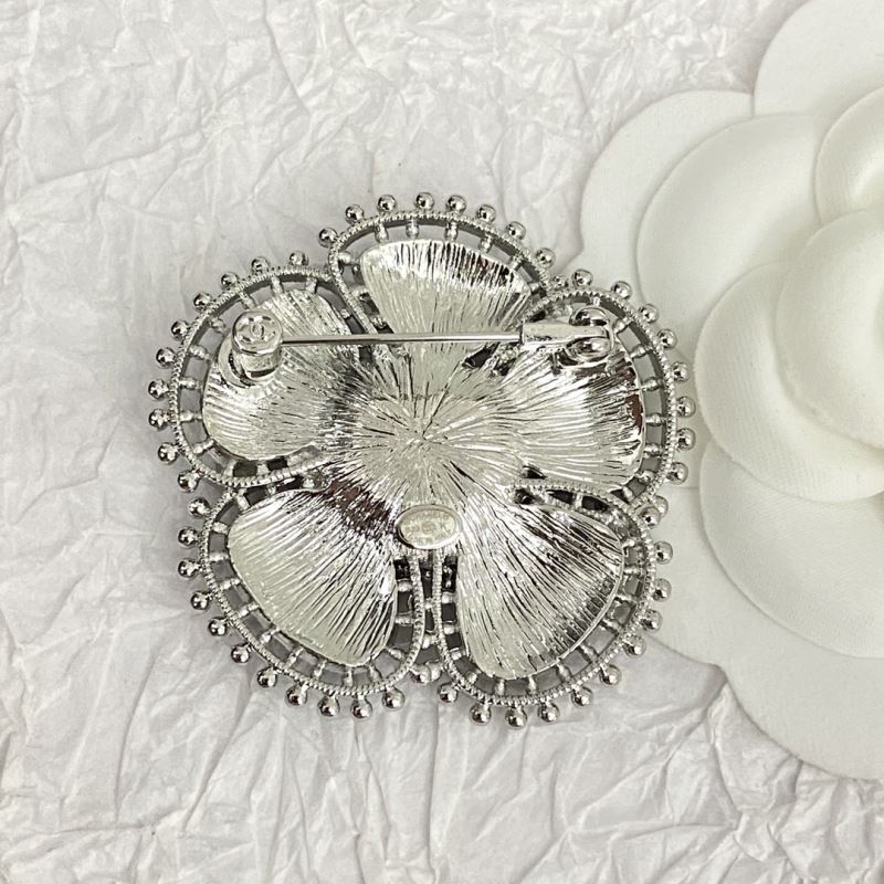 Ch**el brooches
